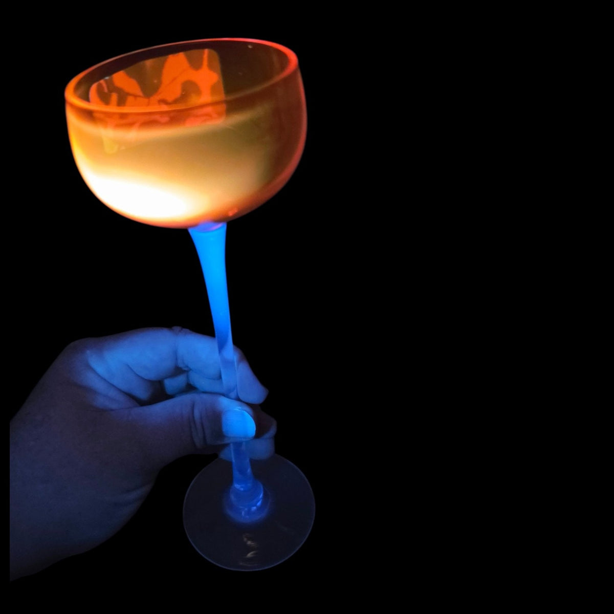Vtg Roscher & Co. Amber Orange Long Stem Cocktail Glasses Set of 2 UV React 8.5"