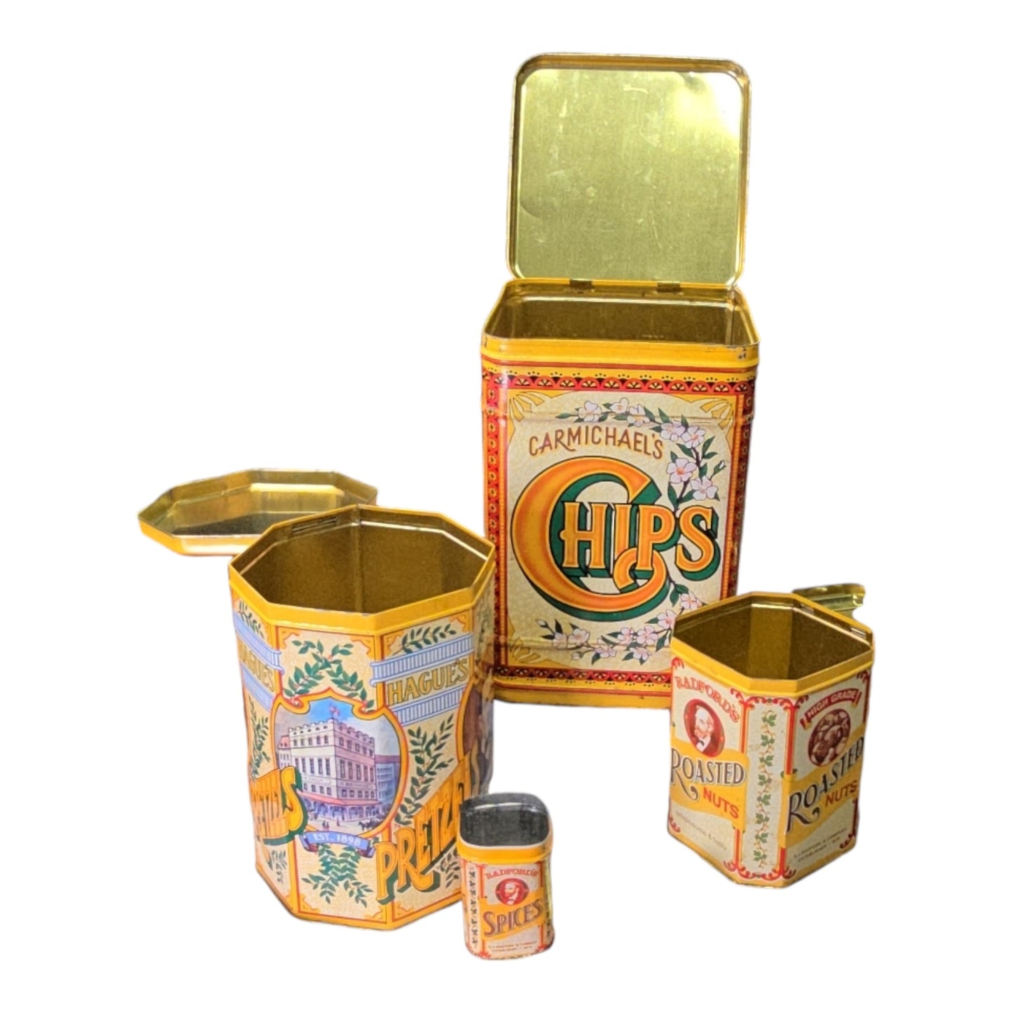 4 pc Vintage Nesting Tin Cannisters, Carmichael's Chips, Hague's Pretzels, Radford's Roasted Nuts and Radford's Spice Jar