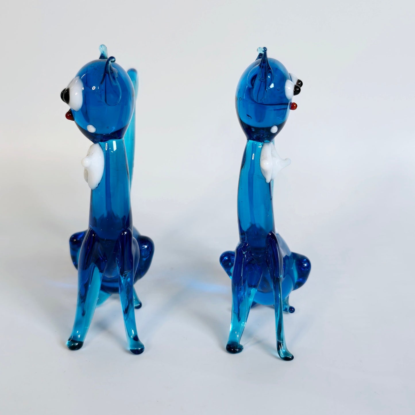 Handblown Pair of Slender Sitting Art Glass Siamese Cats with Bows, Blue Stretch Glass Cats