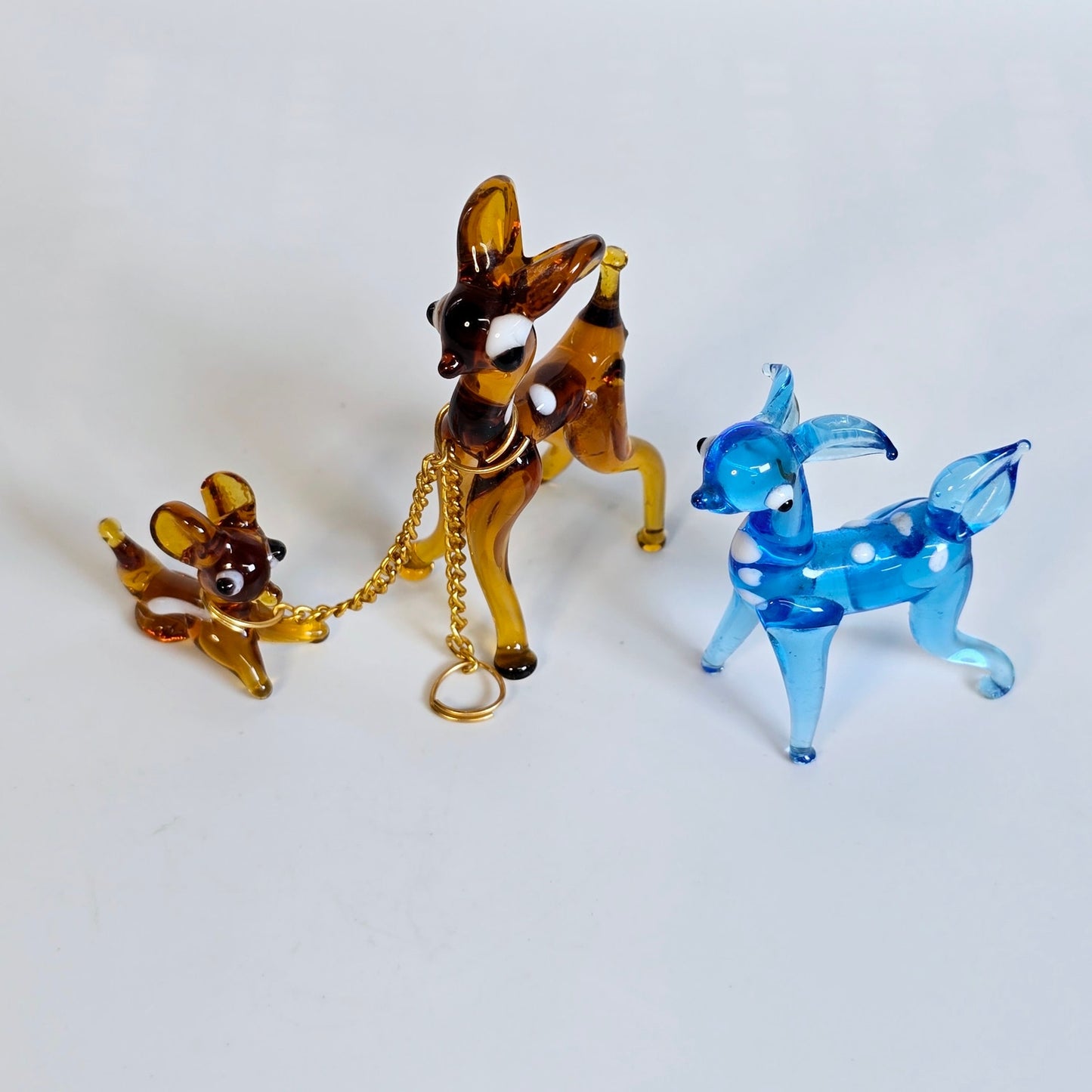 Set of 3 Glass Deers, Doe and two Fawns, Deer Mother Chained to one Baby Deer