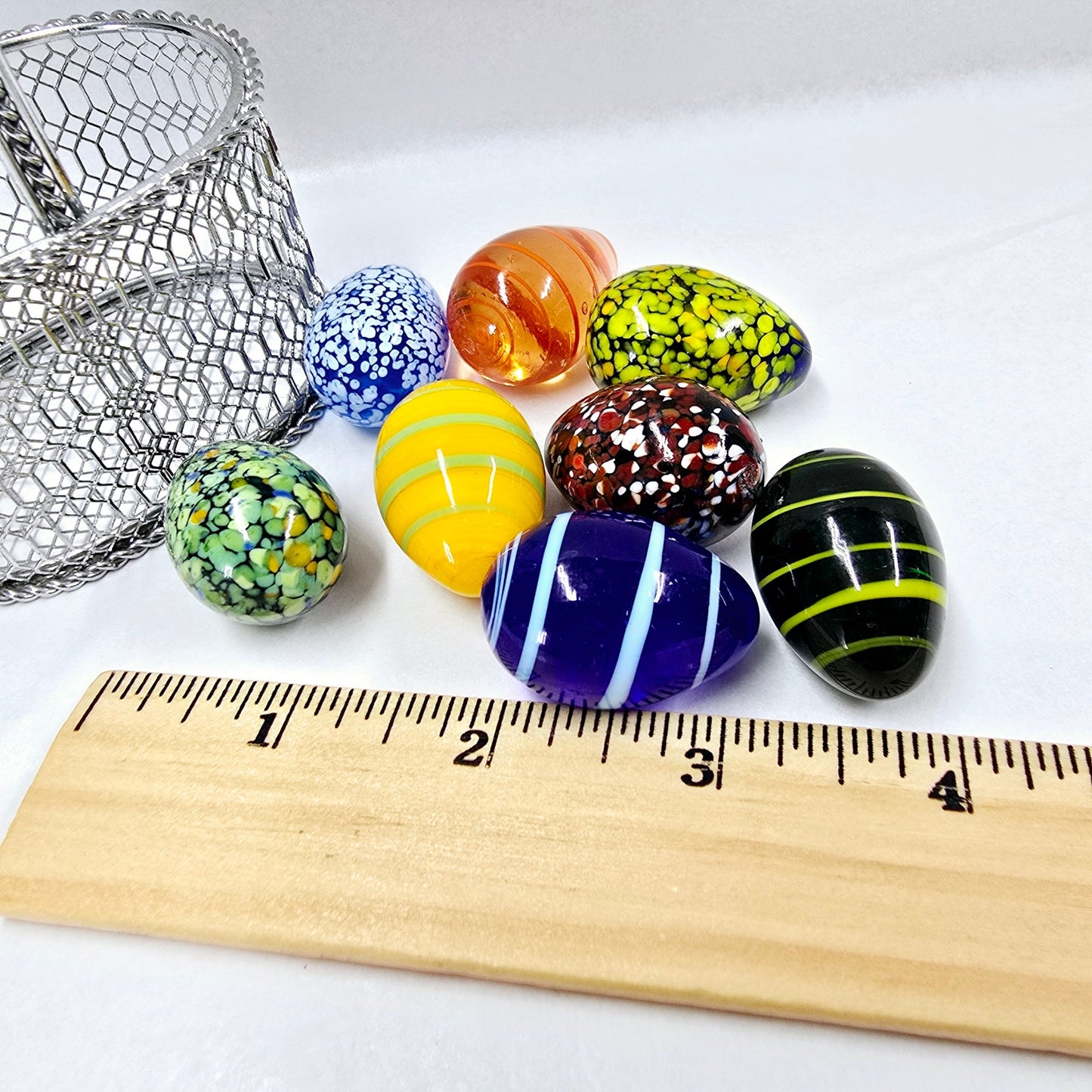 Set of 8 Handblown Small Glass Eggs, Colorful Artisan Glass Eggs in Metal Basket