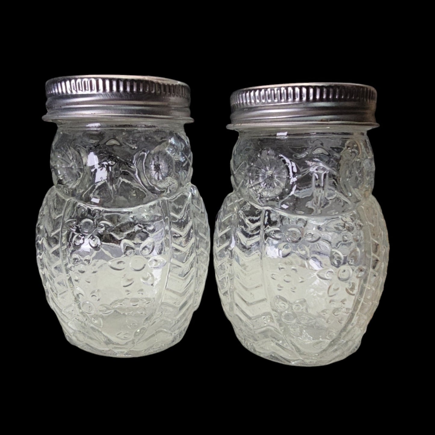 Set of 2 Glass Owl Shakers with Silver Tone Metal Lids, Embossed Floral Pattern